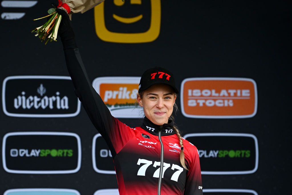 RIJKEVORSEL BELGIUM NOVEMBER 19 Inge Van Der Heijden of The Netherlands and Team 777 celebrates at podium as third place during the 36th Superprestige Merksplas 2022 Womens Elite Superprestige2023 CXWorldCup CycloCross on November 19 2022 in Rijkevorsel Belgium Photo by Luc ClaessenGetty Images