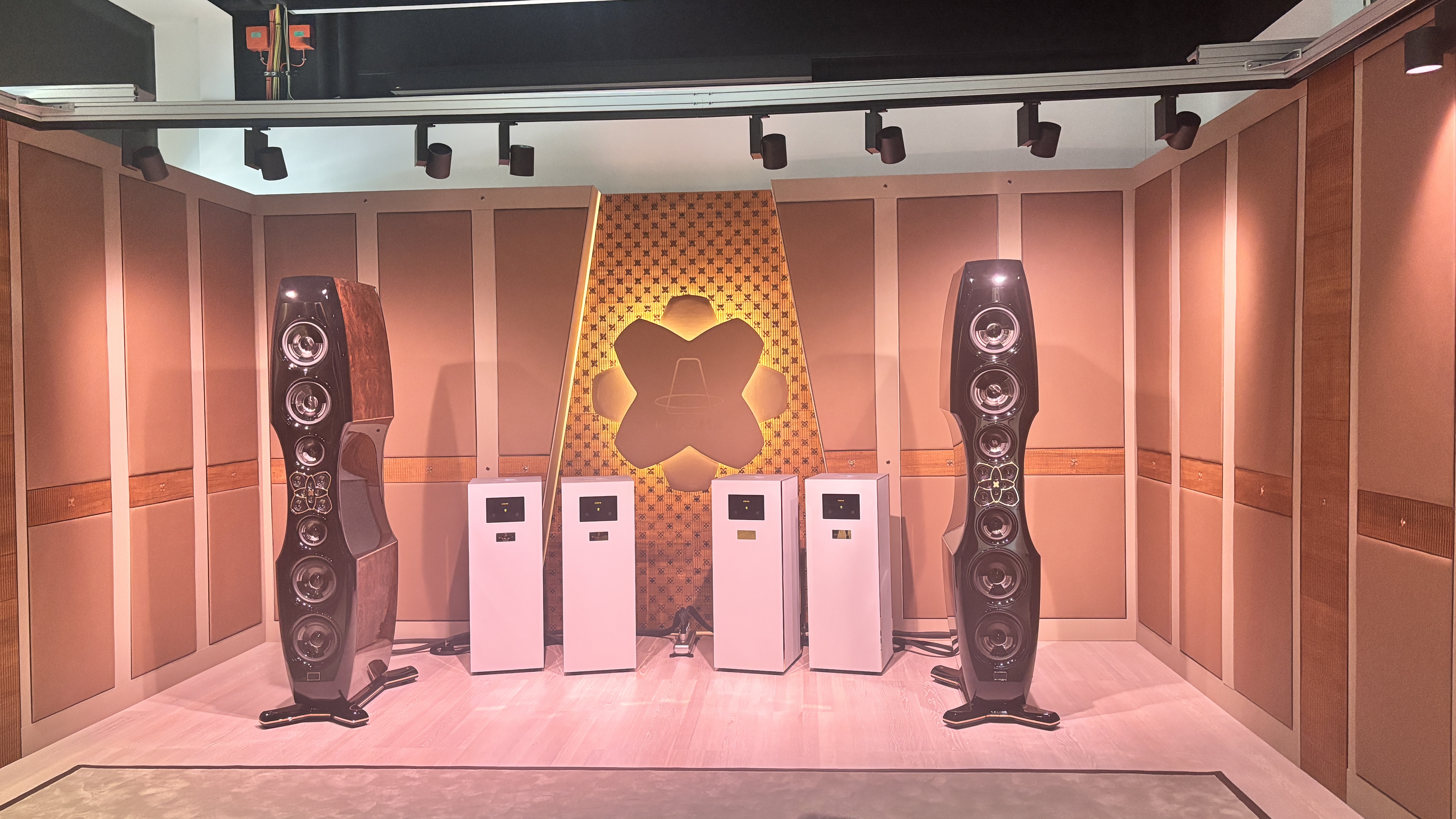 Kharma Enigma Veyron floorstanding speakers flanking an amp setup
