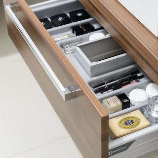drawer with divider for make-up storage