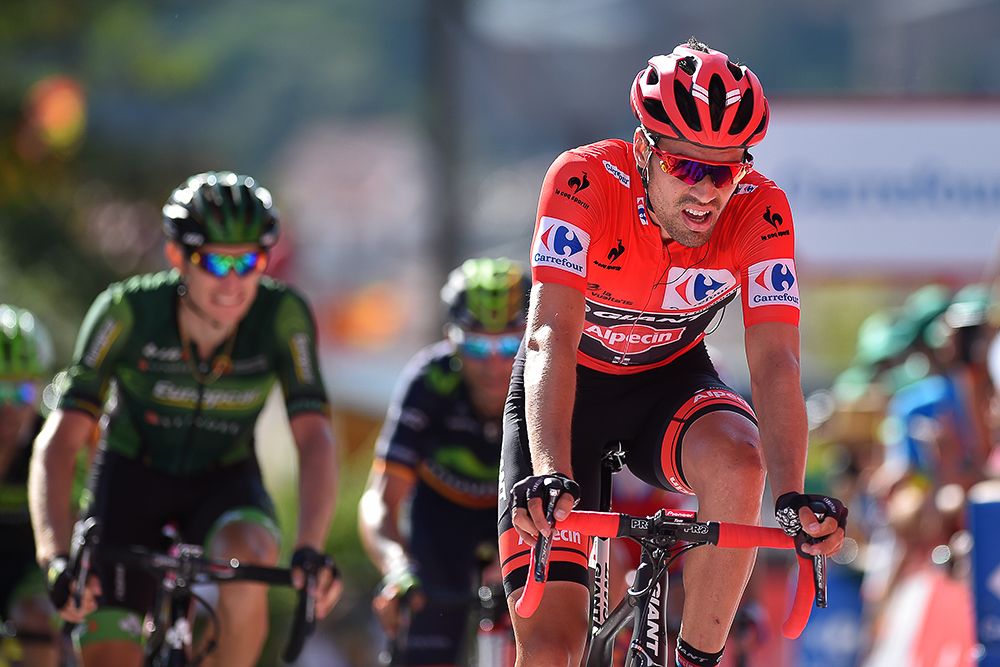 Tom Dumoulin crosses the finish line of stage 20.