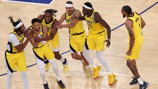 Tyrese Haliburton #0 of the Indiana Pacers is congratulated by his teammates after scoring a game-tying basket against the New York Knicks as time expires in the fourth quarter in Game One of the Eastern Conference Finals of the 2025 NBA Playoffs at Madison Square Garden on May 21, 2025 in New York City. 