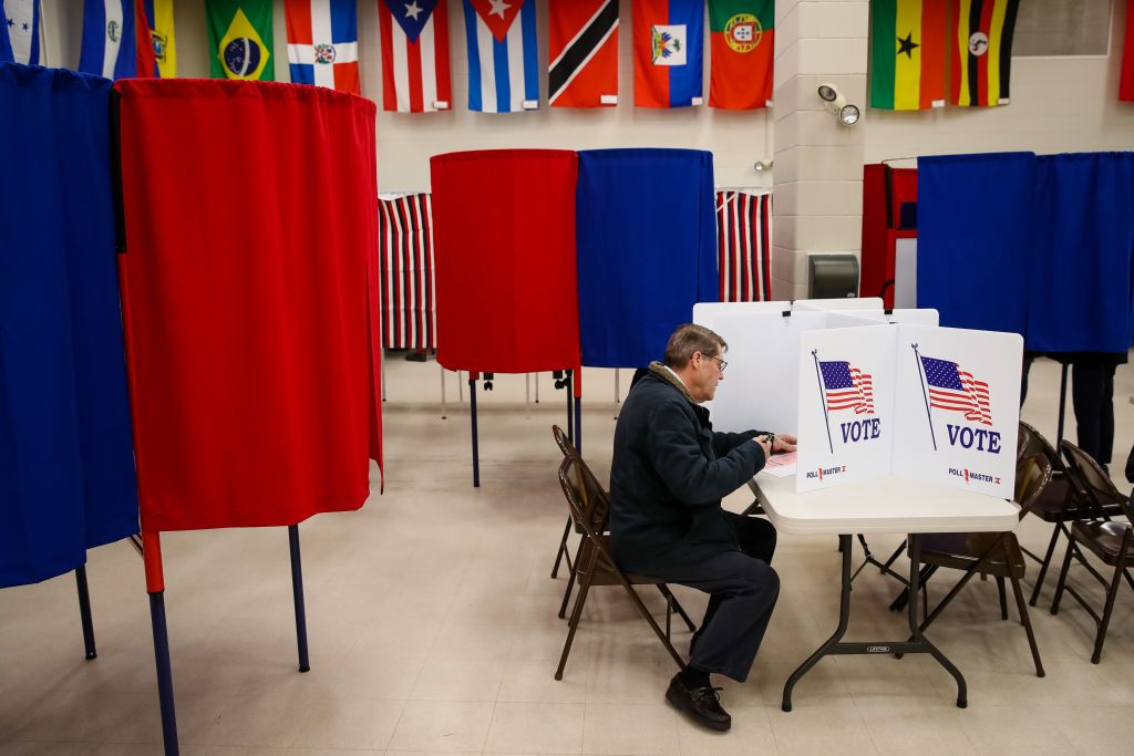 A man votes in Nashua, New Hampshire.