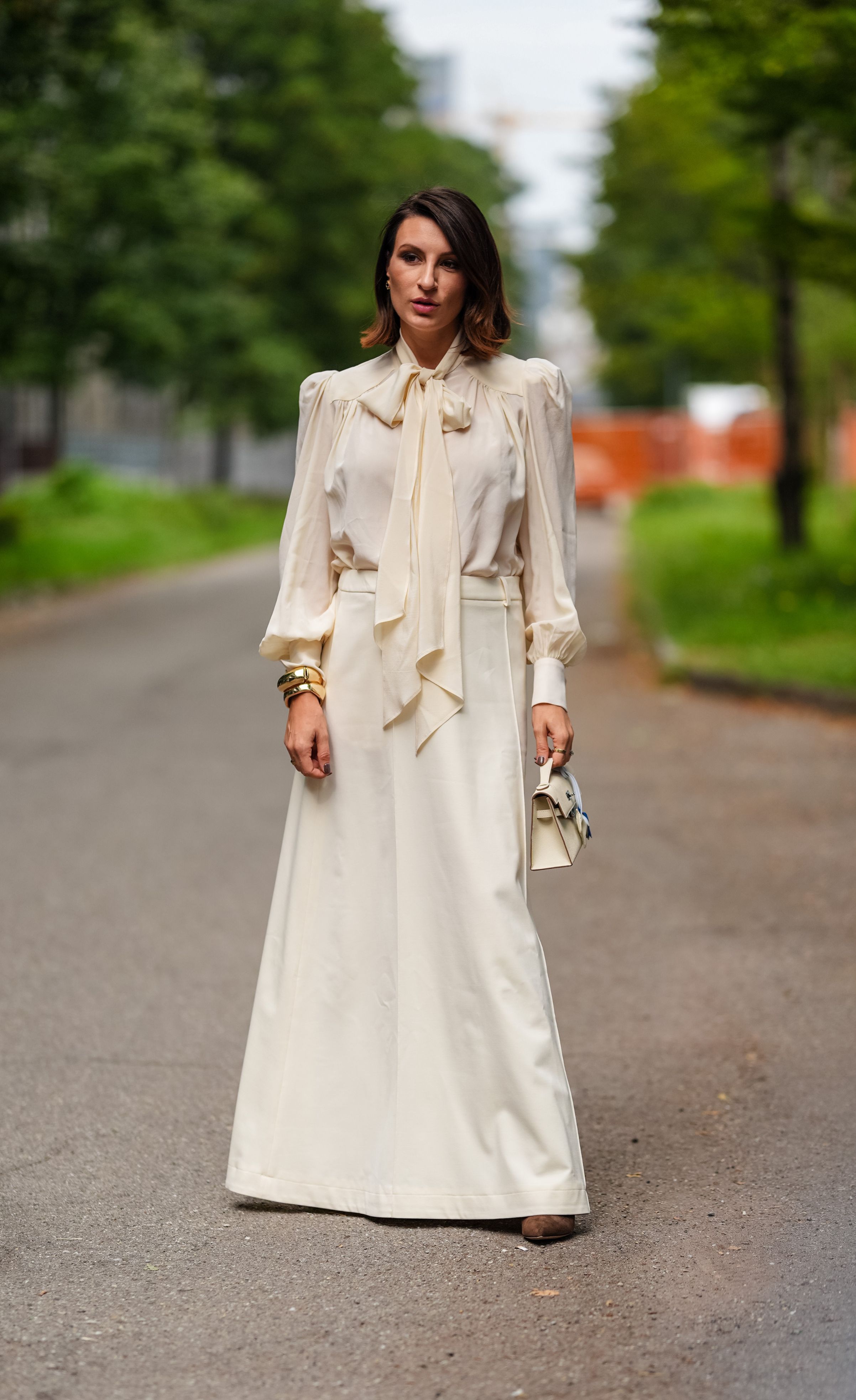 woman wearing long skirt and a blouse