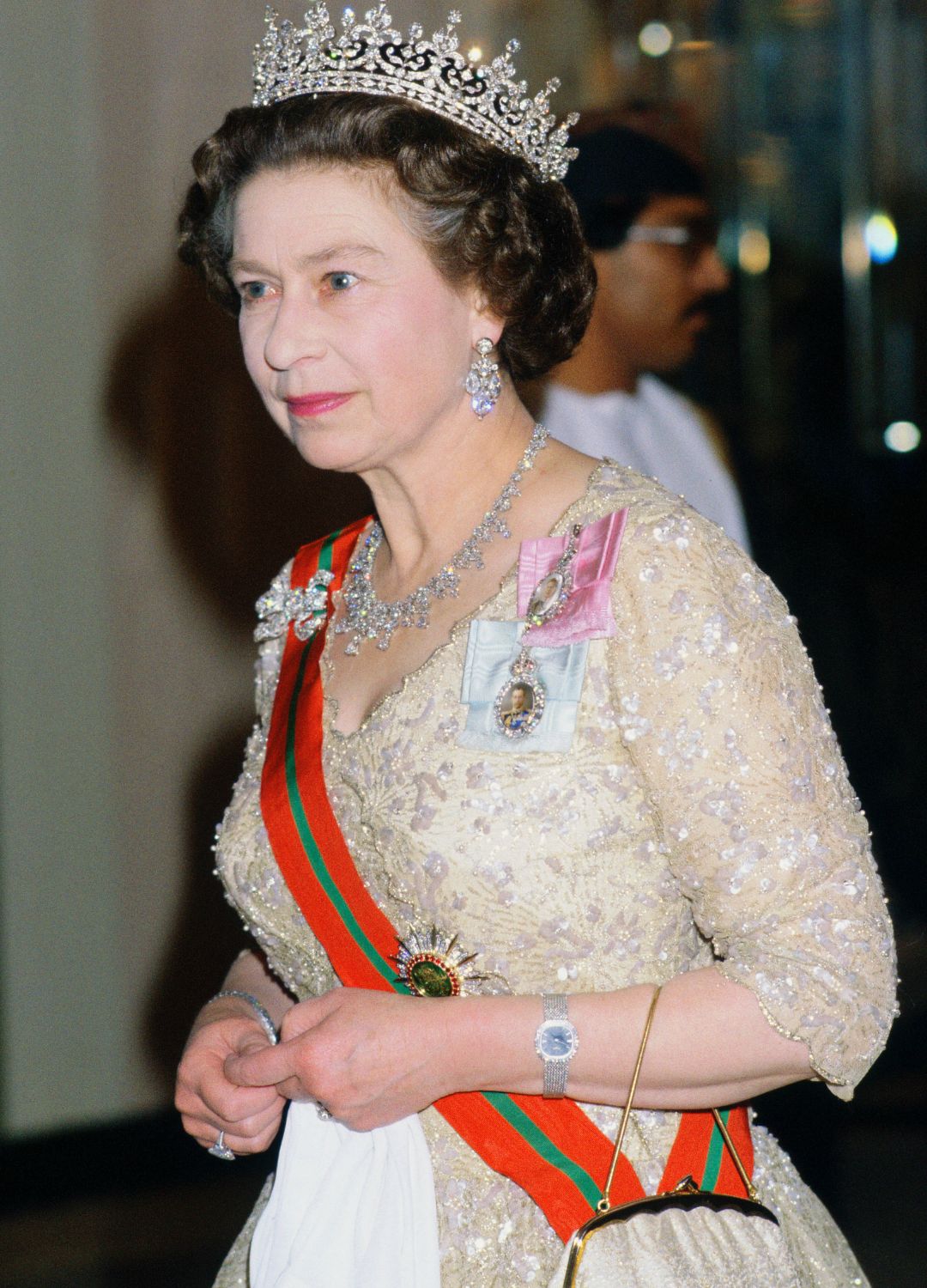 Queen Elizabeth II attending a state banquet at Claridge's, wearing her Golden Ellipse Patek Philippe
