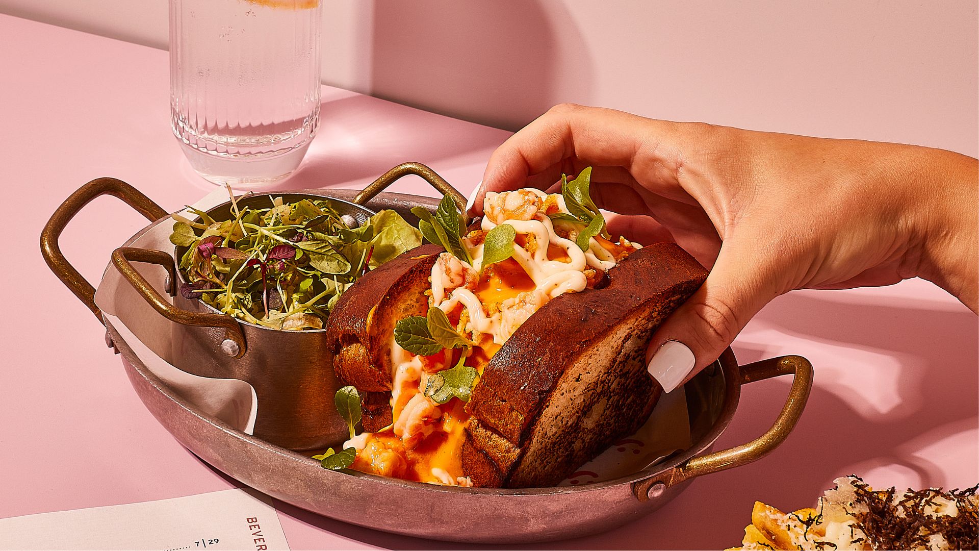 an image of the lunchtime brioche against a pink background