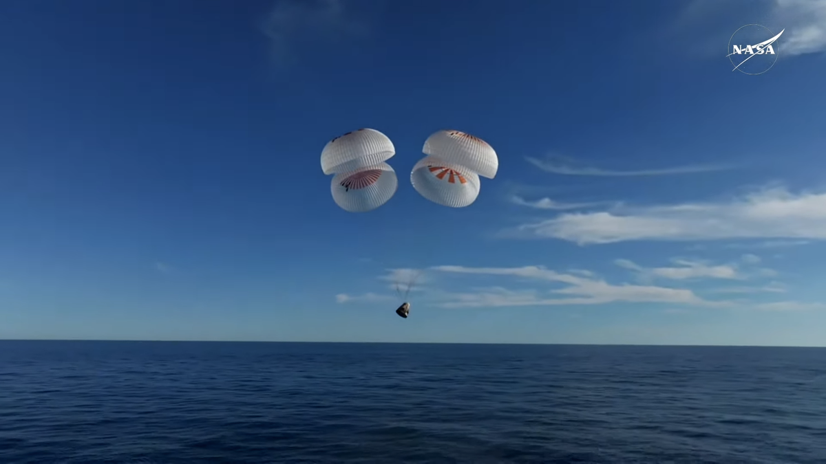 A white SpaceX Dragon capsule bobs in the Gulf of Mexico after splashing down with four Crew-9 astronauts off the coast of Tallahassee, Florida on March 18, 2025.
