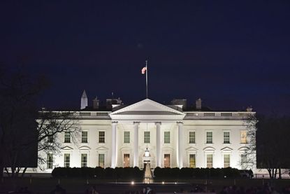 The White House at night.