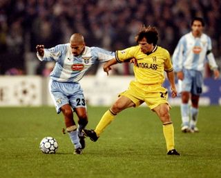 Lazio's Juan Sebastian Veron is challenged by Chelsea's Gianfranco Zola in a Champions League game in 1999.