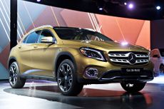 A Mercedes Benz GLA 250 sport utility vehicle (SUV) sits on stage following the vehicle's debut at an event ahead of the 2017 North American International Auto Show (NAIAS) in Detroit, Michigan, U.S., on Sunday, Jan. 8, 2017.