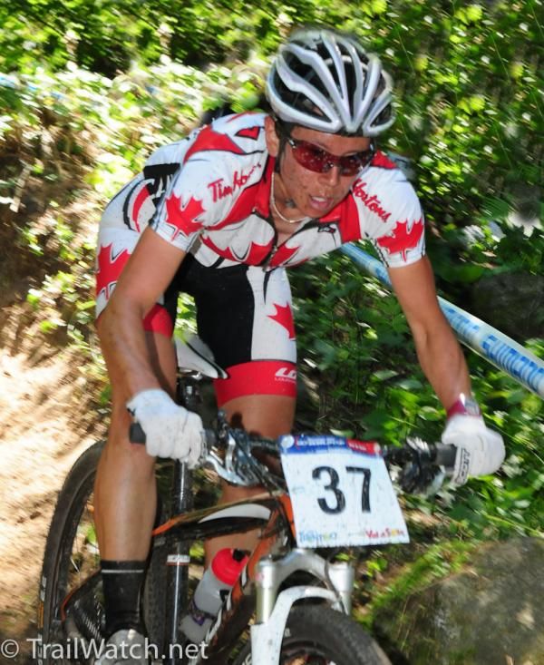 Amanda Sin (Team Canada) descending a steep trail