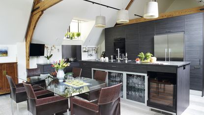 black kitchen in a converted chapel