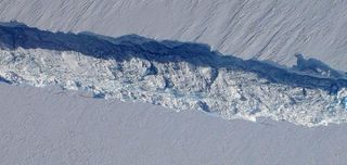 A close-up view of the growing rift in the Pine Island Glacier's ice shelf. On last check the crack was about 200 feet (60 meters) deep. The shelf itself is approximately 1,600 feet (500 meters) thick.