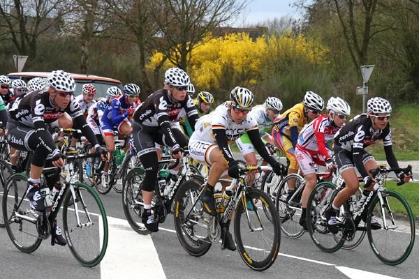 The peloton rides out of Coevorden.