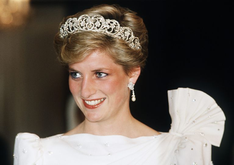 Diana, Princess of Wales, wearing a white dress designed by David and Elizabeth Emanuel with the Spencer Tiara