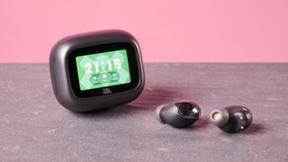JBL Live Buds 4 on table
