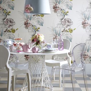 dining room with white table and white tea cups