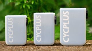 Cycplus AS2 e-pump range on a wall comparing size