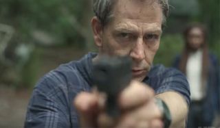 Ben Mendelsohn points gun The Outsider HBO