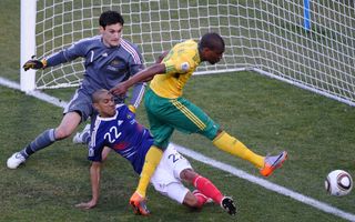 South Africa striker Katlego Mphela scores against France at the 2010 World Cup.