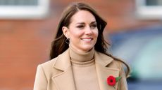 Kate Middleton wears a camel coat and matching top as she visits 'The Street' community hub during an official visit to Scarborough on November 3, 2022 in Scarborough, England. 