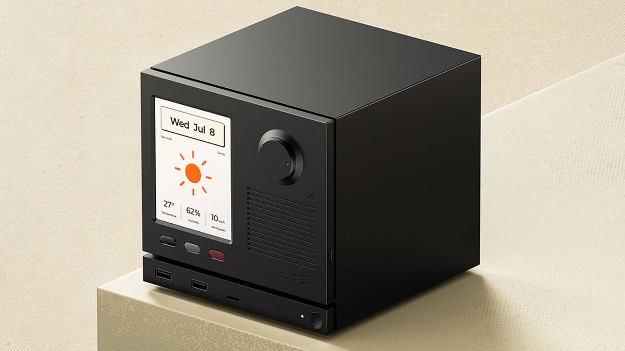 Jsaux Steam Machine faceplate with small color e-ink display on left and dial on right with black, grey, and red buttons under screen.