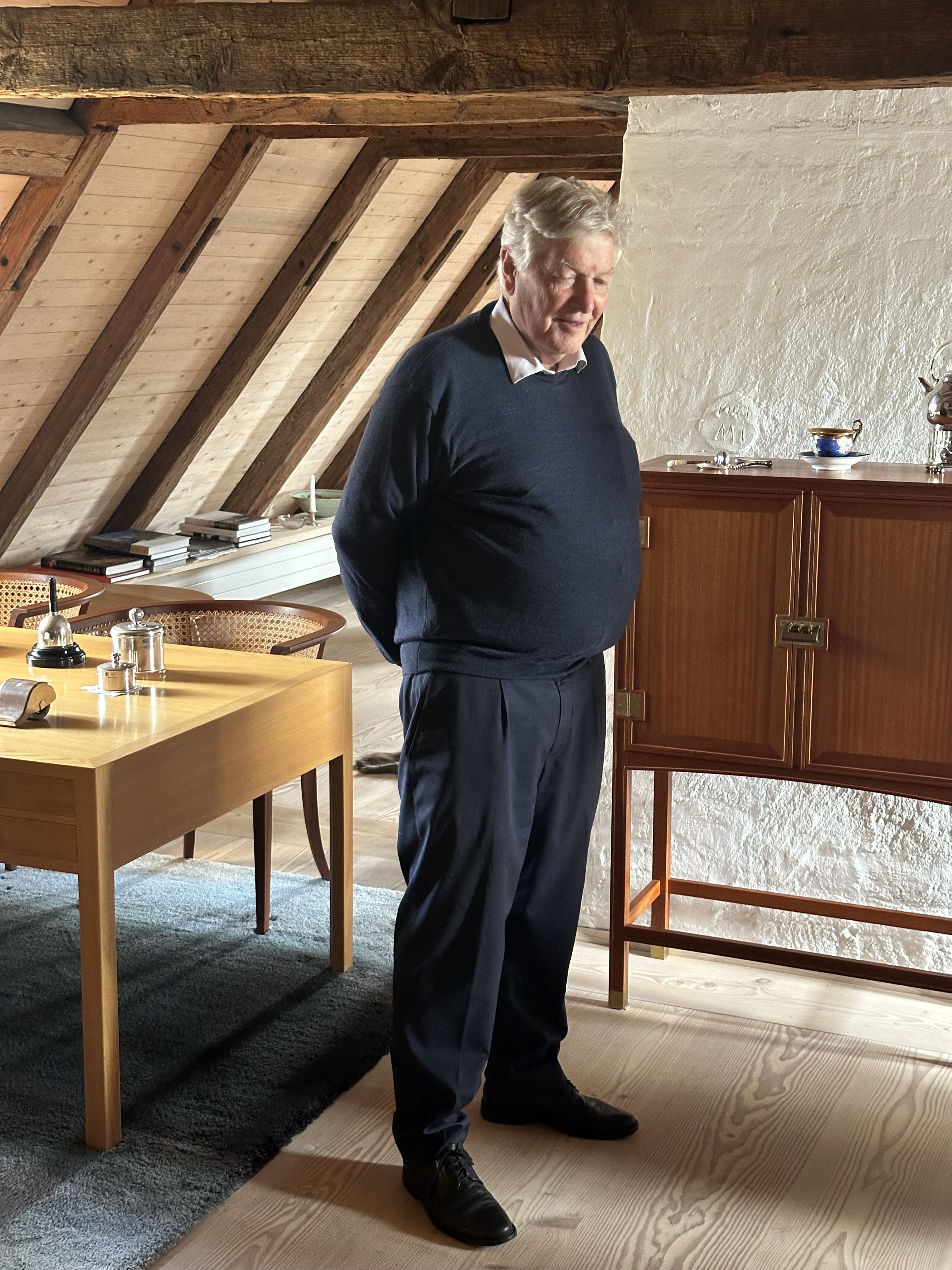 Knud Eric Hansen in the attic of his castle home