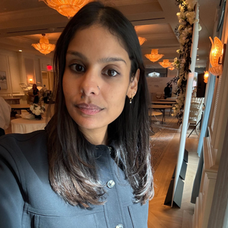 Neha, Marie Claire's Entertainment Director, tests the OUAI Gloss In-Shower Shine Treatment