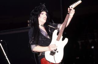 Mick Mars performs onstage with Mötley Crüe at the Joe Louis Arena on September 15, 1985, in Detroit, Michigan