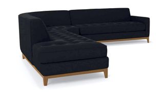 A black velvet corner sectional sofa from APT2B