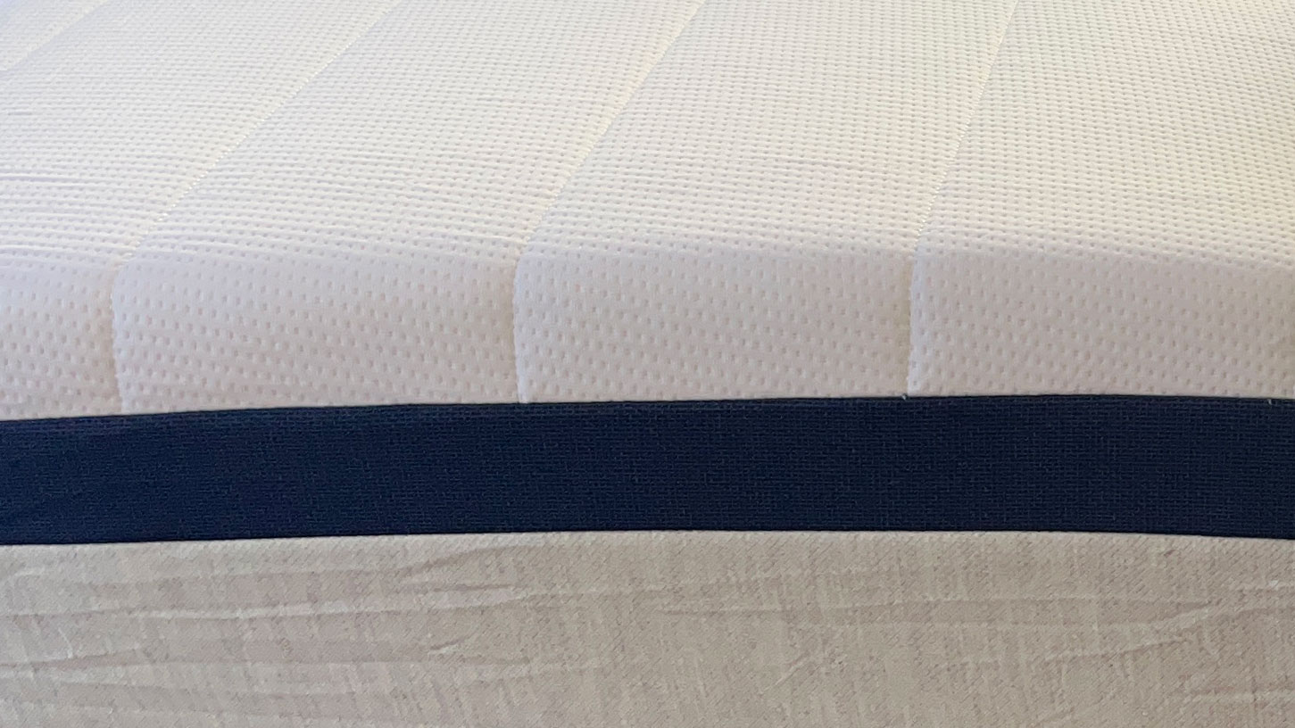 Close up for fabric topper on Helix Midnight mattress
