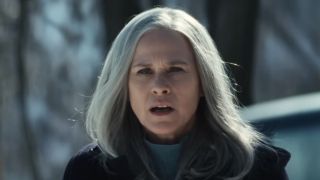 Ms. Cobel standing outside in the snow talking to mark and Devon in Severance Season 2