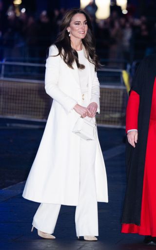 Kate Middleton carrying strathberry for a christmas service