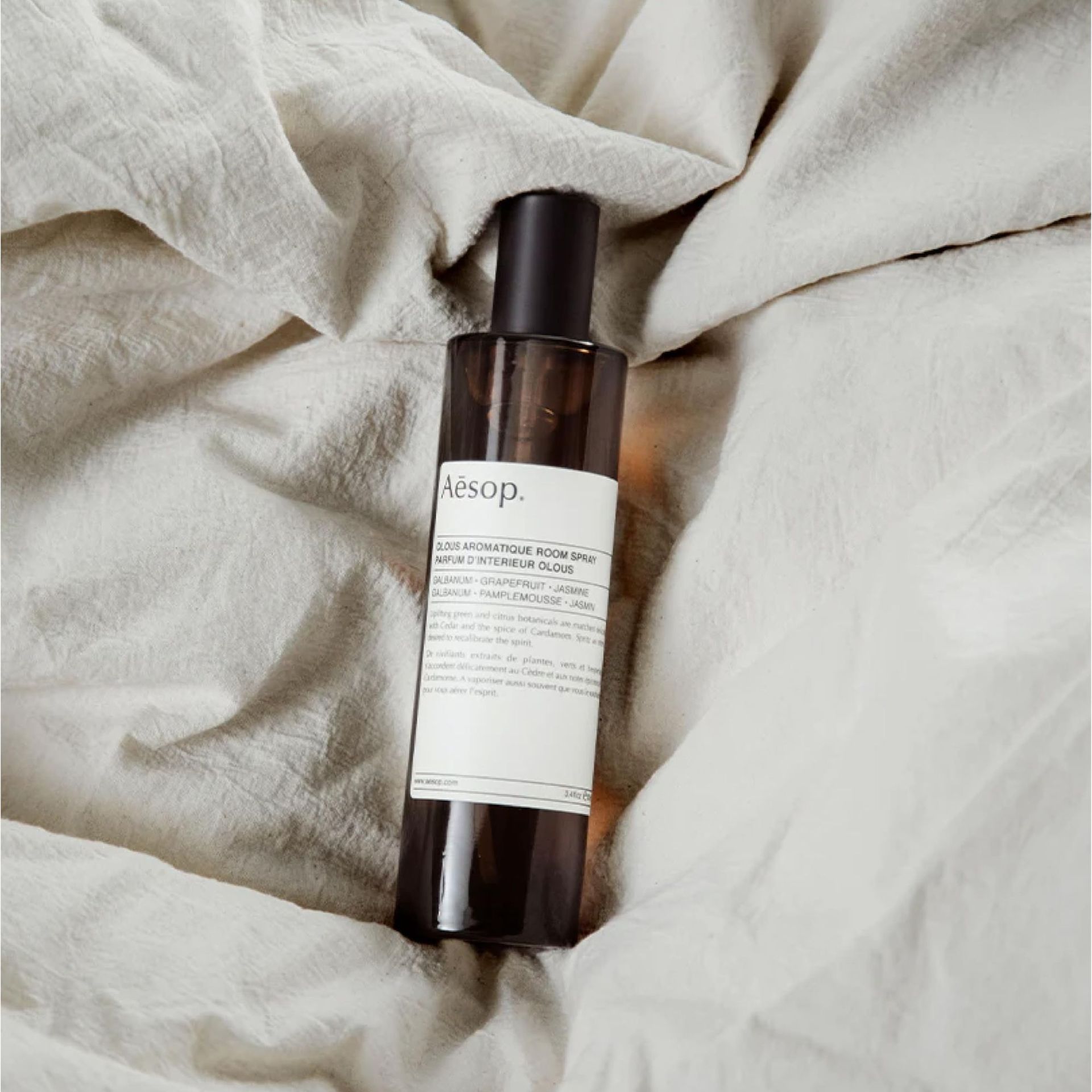 Aesop Aromatique Room Spray on linen.