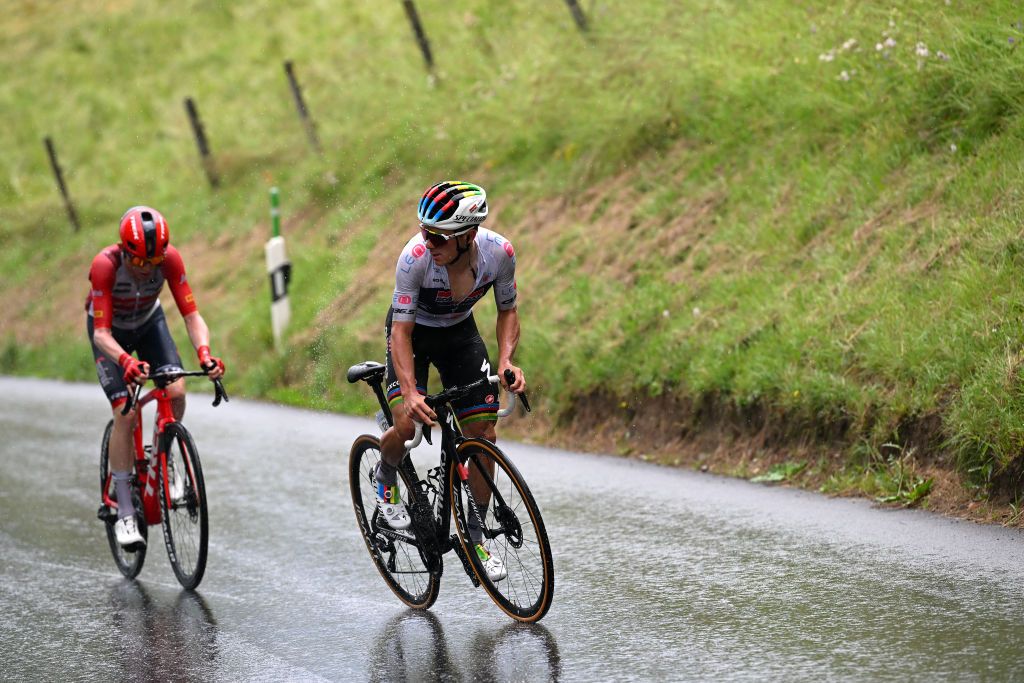 VILLARSSUROLLON SWITZERLAND JUNE 13 LR Mattias Skjelmose Jensen of Denmark and Team TrekSegafredo and Remco Evenepoel of Belgium and Team Soudal QuickStep White best young jersey compete in the chase group during the 86th Tour de Suisse 2023 Stage 3 a 1438km stage from Tafers to VillarssurOllon 1256m UCIWT on June 13 2023 in VillarssurOllon Switzerland Photo by Dario BelingheriGetty Images