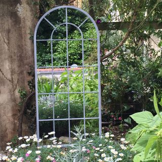 Outdoor arched mirror from Not on the high street
