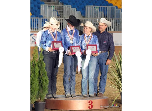 Bronze medal team Isobel Le Pla, Fiona Howard, Tabitha Sternberg Allen and Doug Allen (Chef d&amp;rsquo;Equipe) on the podium