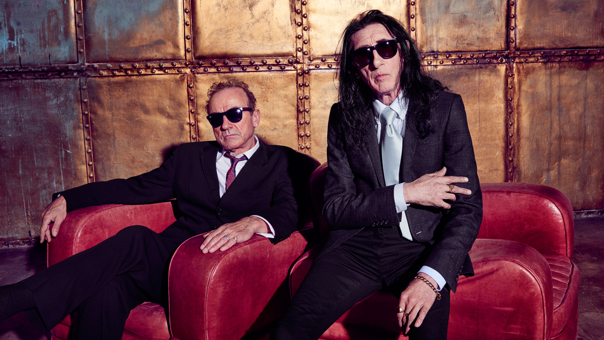 A promotional photograph of Hugh Cornwell and John Cooper Clarke