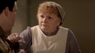 Lesley Nicol gives Rob James-Collier a serious look in conversation in Downton Abbey.