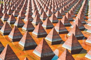 Miniature pyramids as part of outdoor fountain