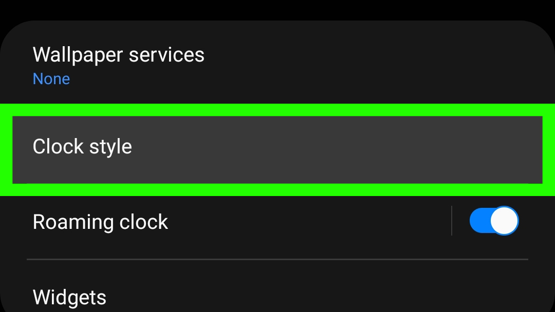 Clock style highlighted with a green box within the Lock screen submenu in the Settings app of a Samsung S21