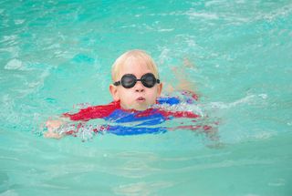 boy in swimming pool.