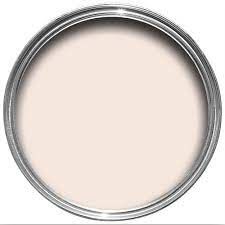 A tin of pale pink paint