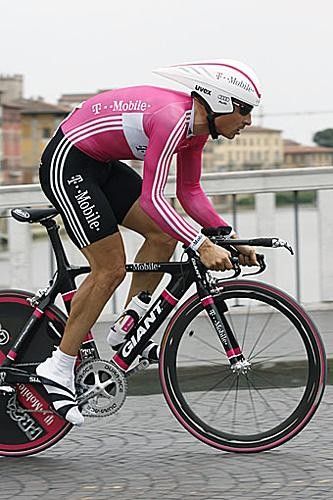 Olaf Pollack (T-Mobile) crosses the river Arno