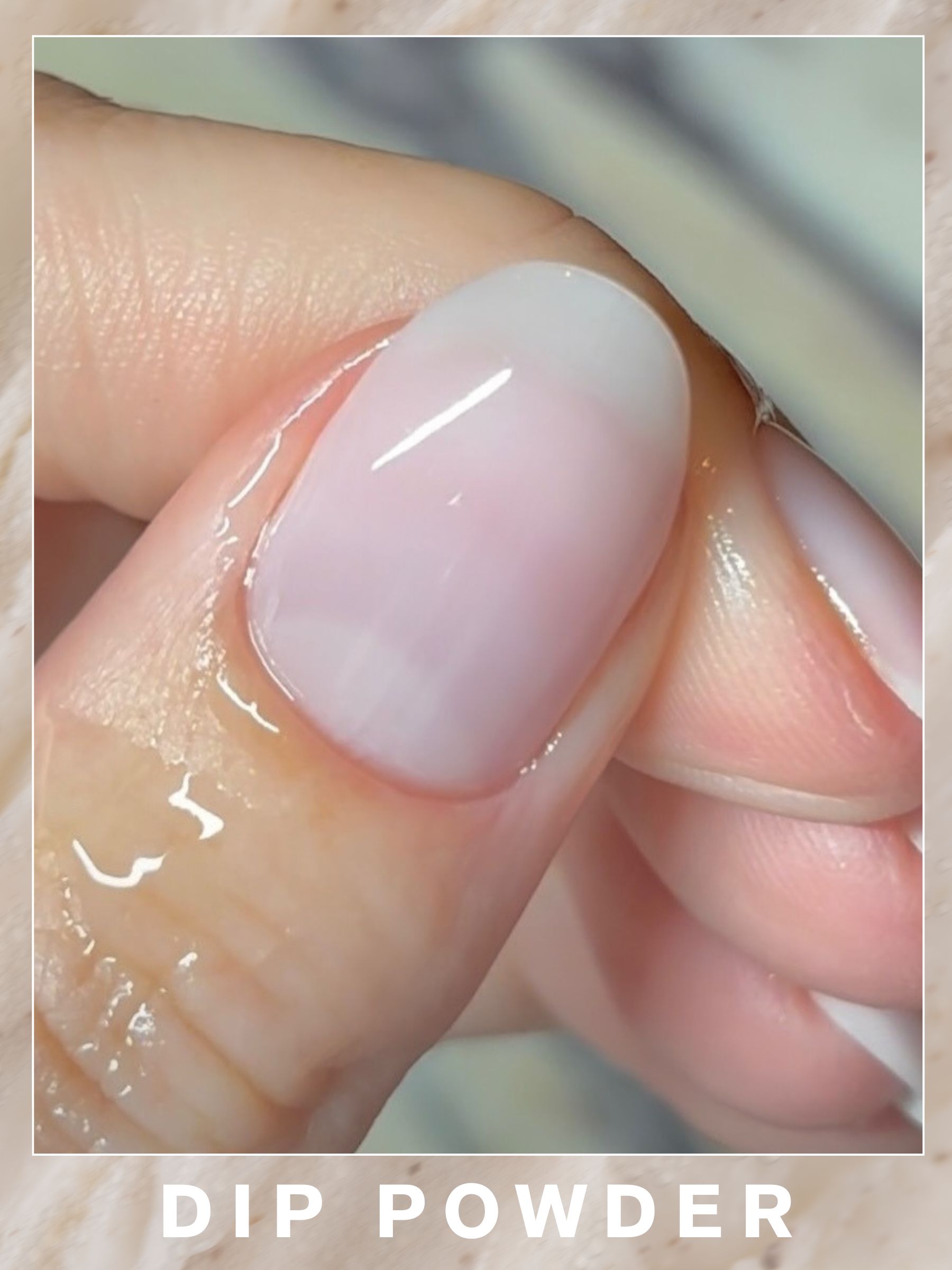 A neutral dip powder manicure