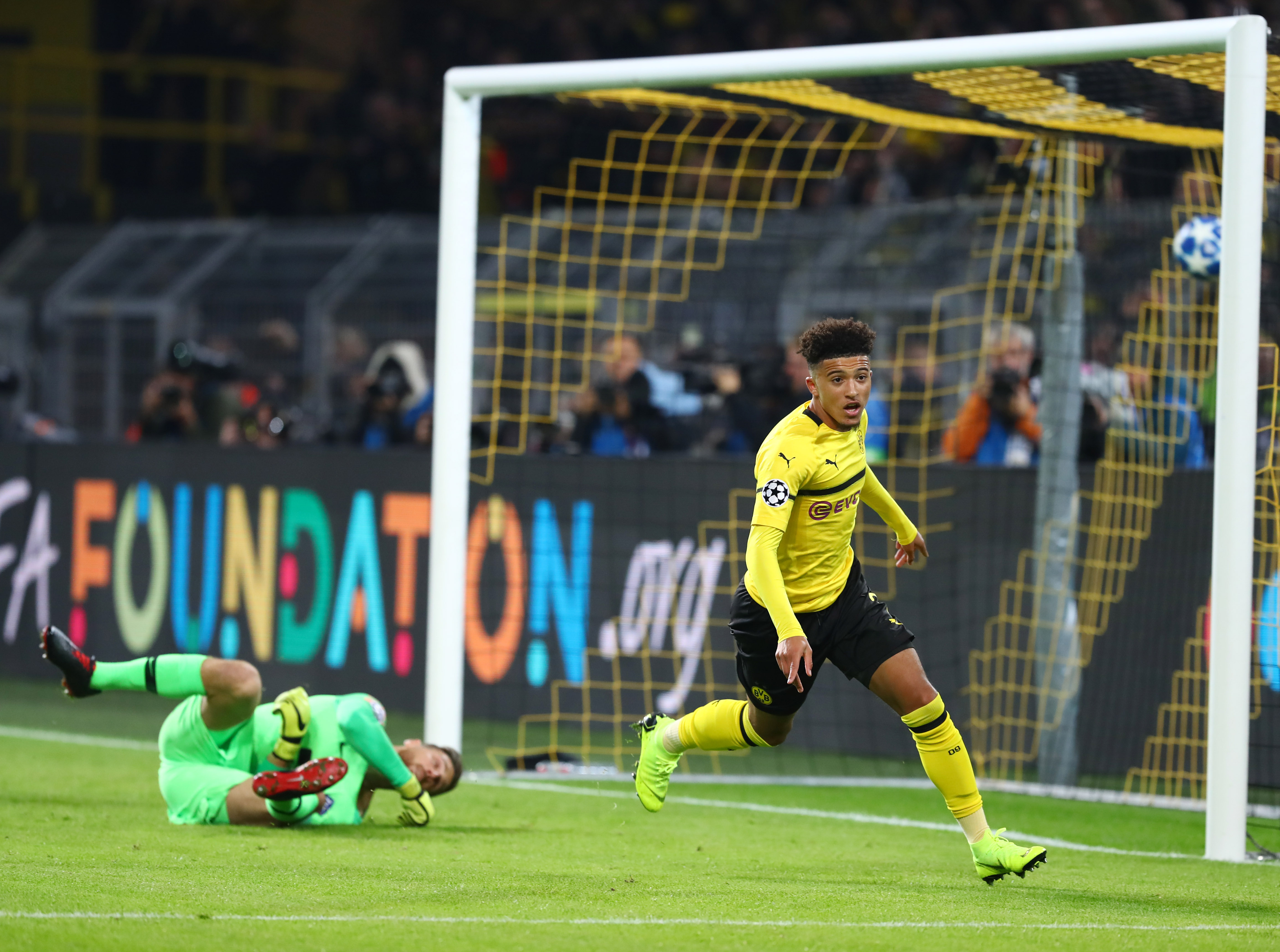 Jadon Sancho scores for Borussia Dortmund against Atletico Madrid in the Champions League in October 2018.