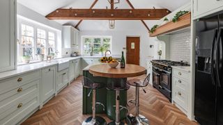 farmhouse kitchen with island with circular seating area