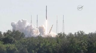 A SpaceX Falcon 9 rocket and Dragon cargo ship lift off from Space Launch Complex 40 at the Cape Canaveral Air Force Station, Florida on Dec. 15, 2017 to deliver NASA cargo to the International Space Station. Both the rocket and Dragon have flown in space