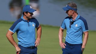 Viktor Hovland and Luke Donald, Captain of Team Europe talk during a practice round prior to the 2023 Ryder Cup at Marco Simone Golf Club on September 27, 2023 in Rome, Italy.