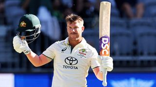 Australia vs Pakistan live stream: David Warner celebrates his 150 in the First Test GettyImages-1846254184