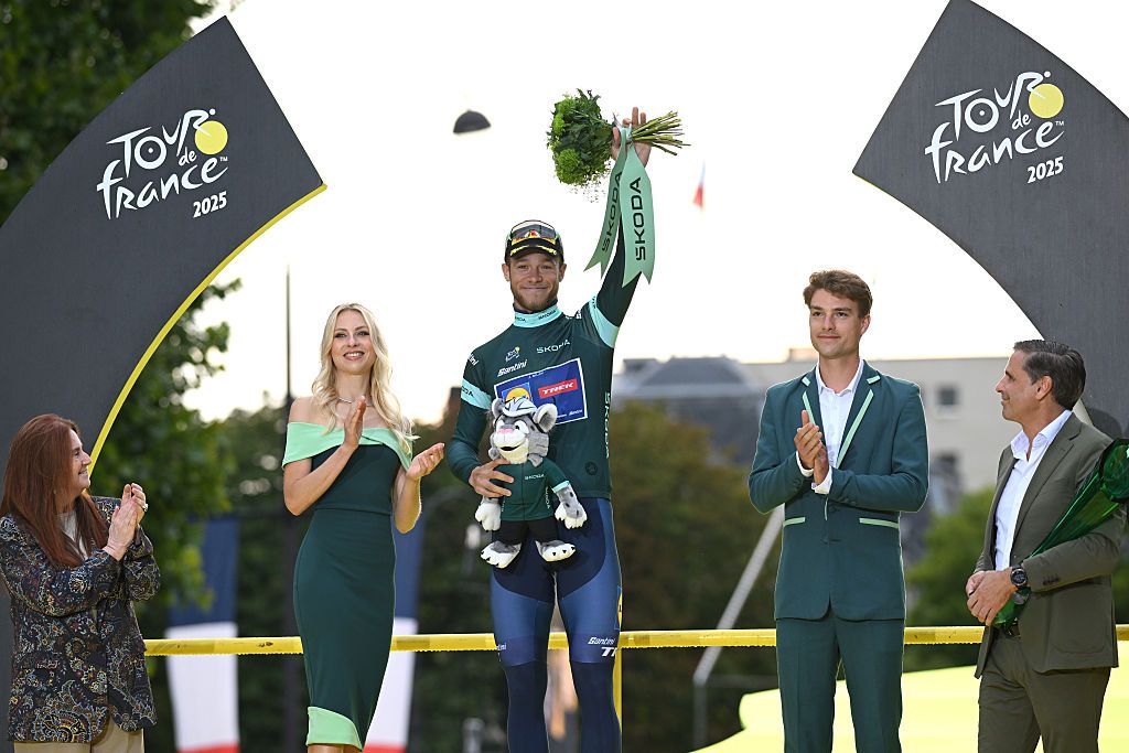 PARIS - CHAMPS-ELYSEES, FRANCE - JULY 27: Jonathan Milan of Italy and Team Lidl - Trek celebrates at podium as Green Sprint Jersey winner during the 112th Tour de France 2025, Stage 21 a 132.3km stage from Mantes-la-Ville to Paris - Champs-Elysees / #UCIWT / on July 27, 2025 in Paris - Champs-Elysees, France.